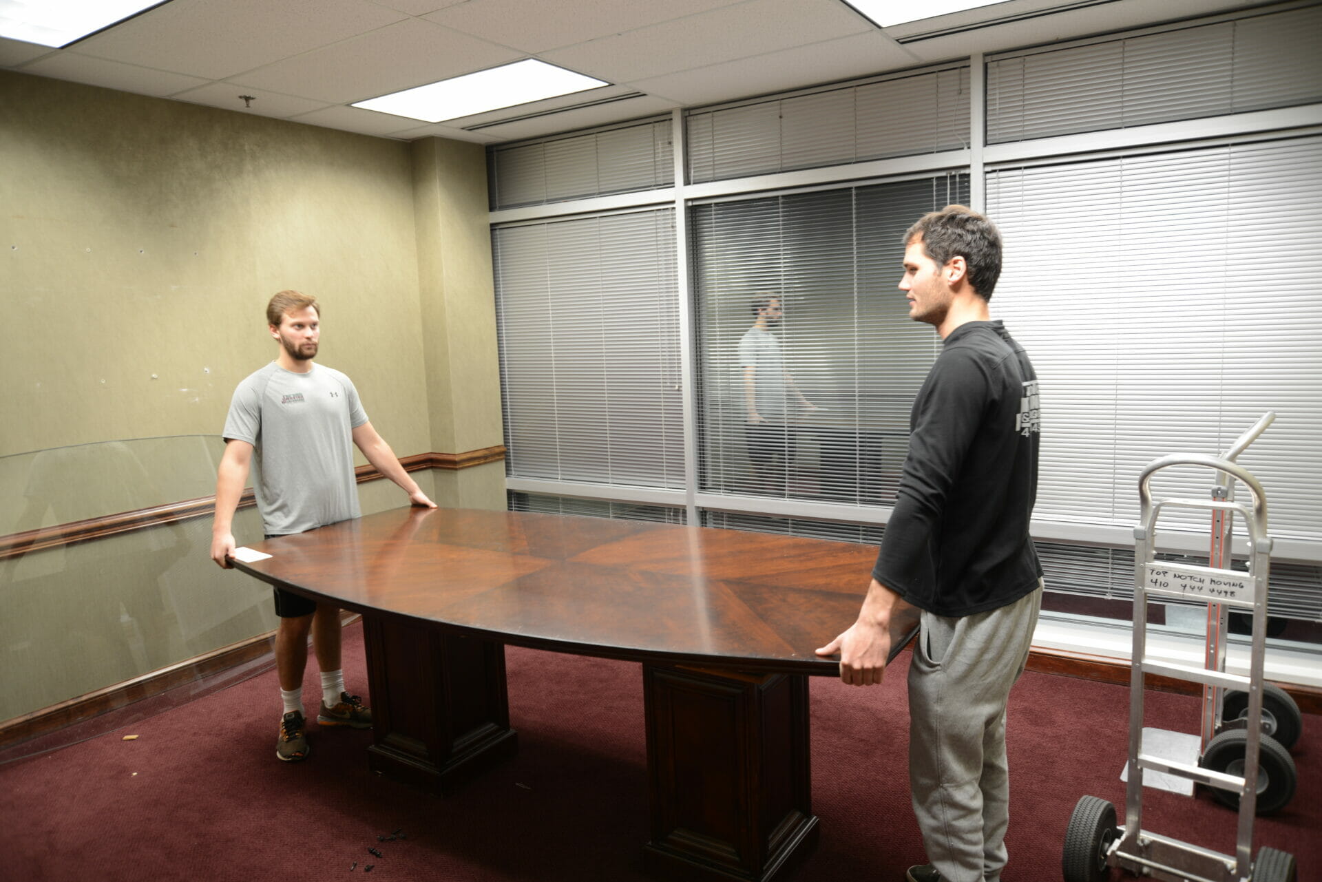 Conference room table being moved